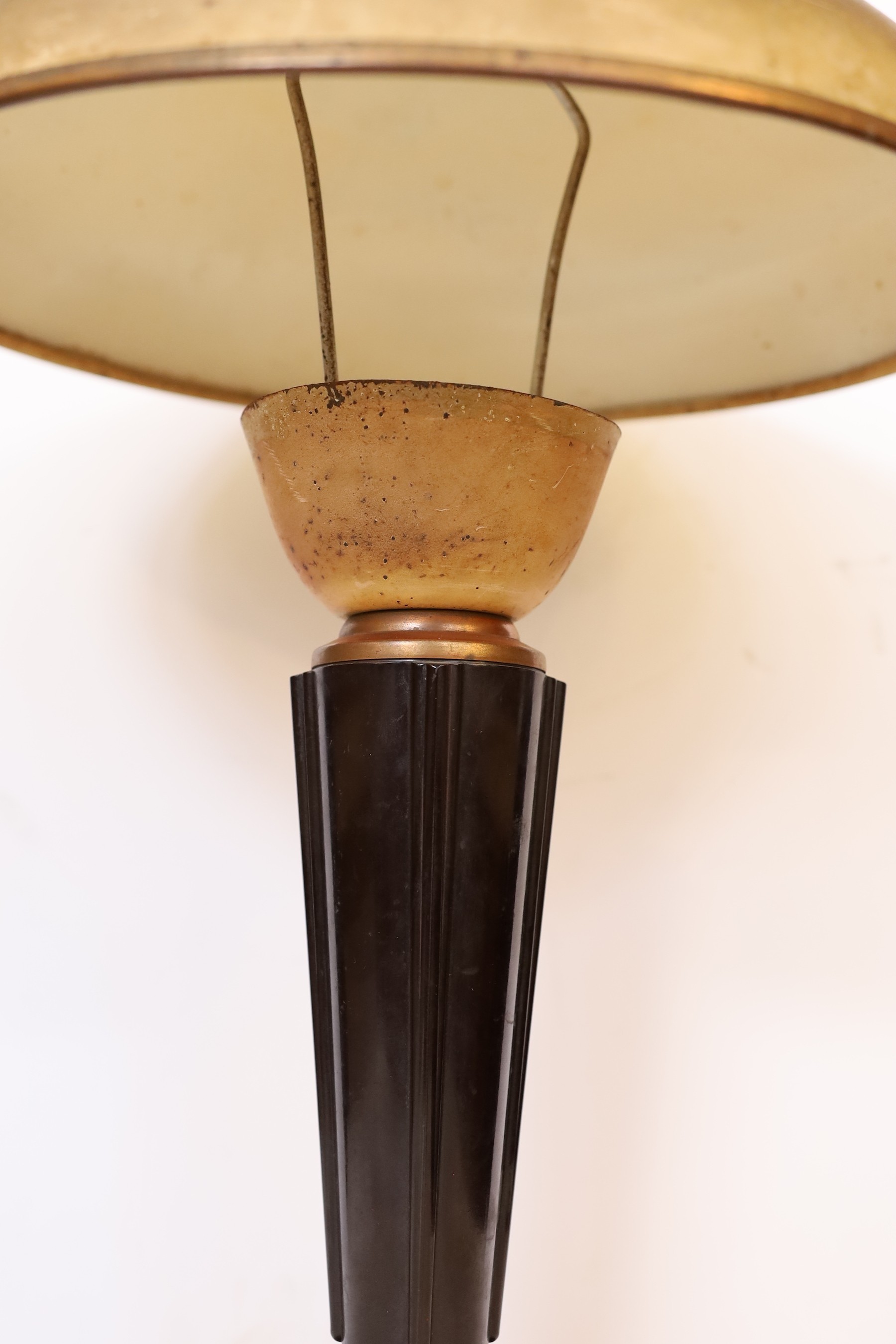 A 1930s French black phenolic and coppered metal table lamp, height 49cm